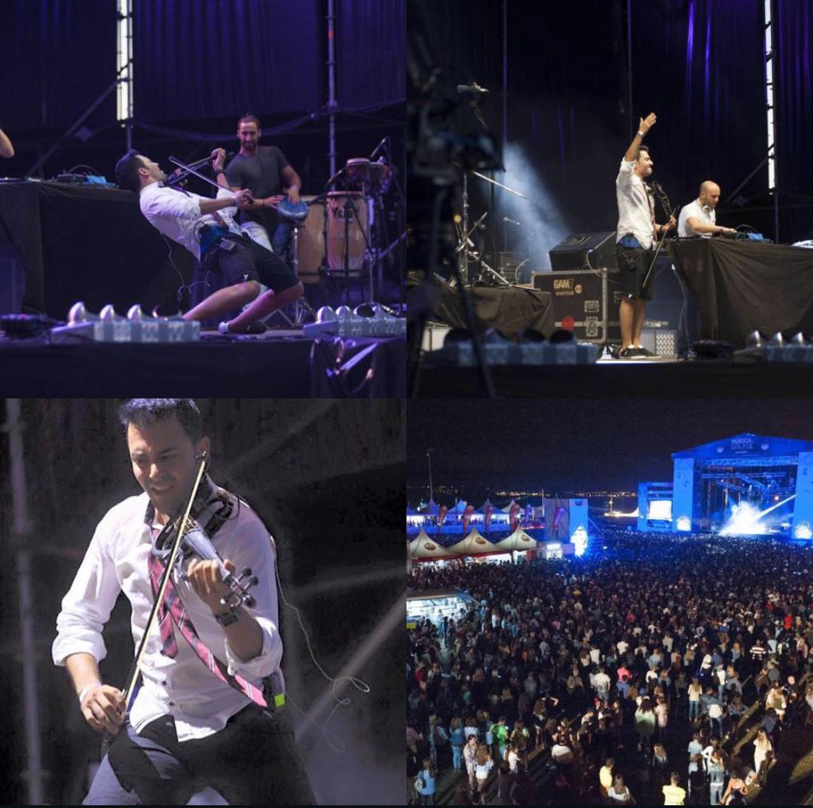 Escenario y público en festival masivo con actuación en directo